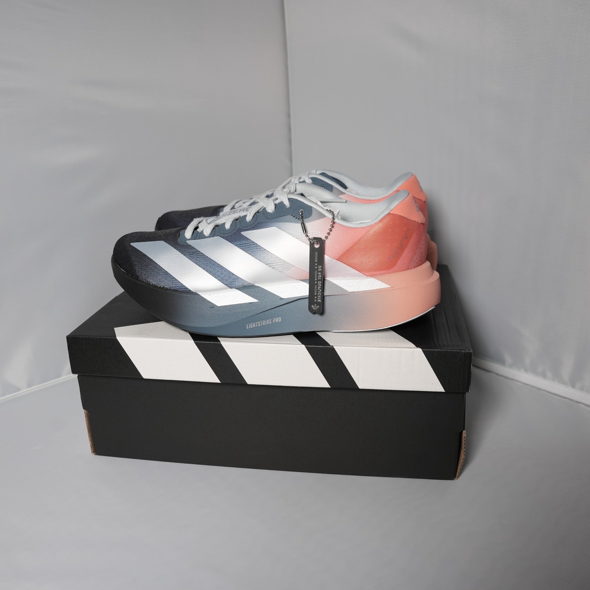 adidas Adizero Evo SL The Whitaker Group Do Not Duplicate Dayglow Blue Clay